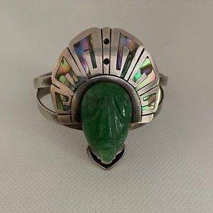 Sterling cuff by Mexican artist Cheo of Aztec warrior w abalone headdress.